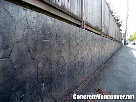 Stamped concrete retaining wall overlay